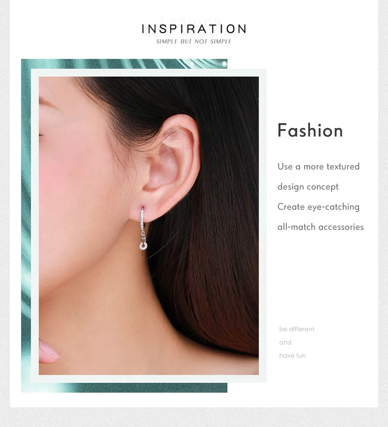 The Dangling CZ Safety Pin Drop Earrings