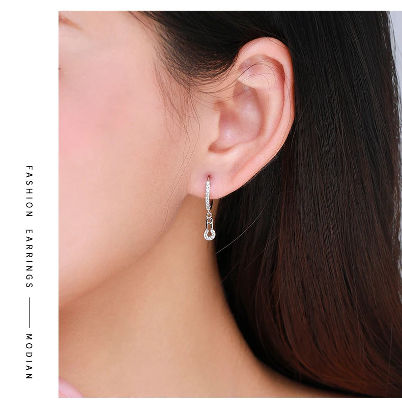 The Dangling CZ Safety Pin Drop Earrings