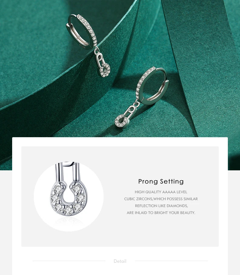 The Dangling CZ Safety Pin Drop Earrings