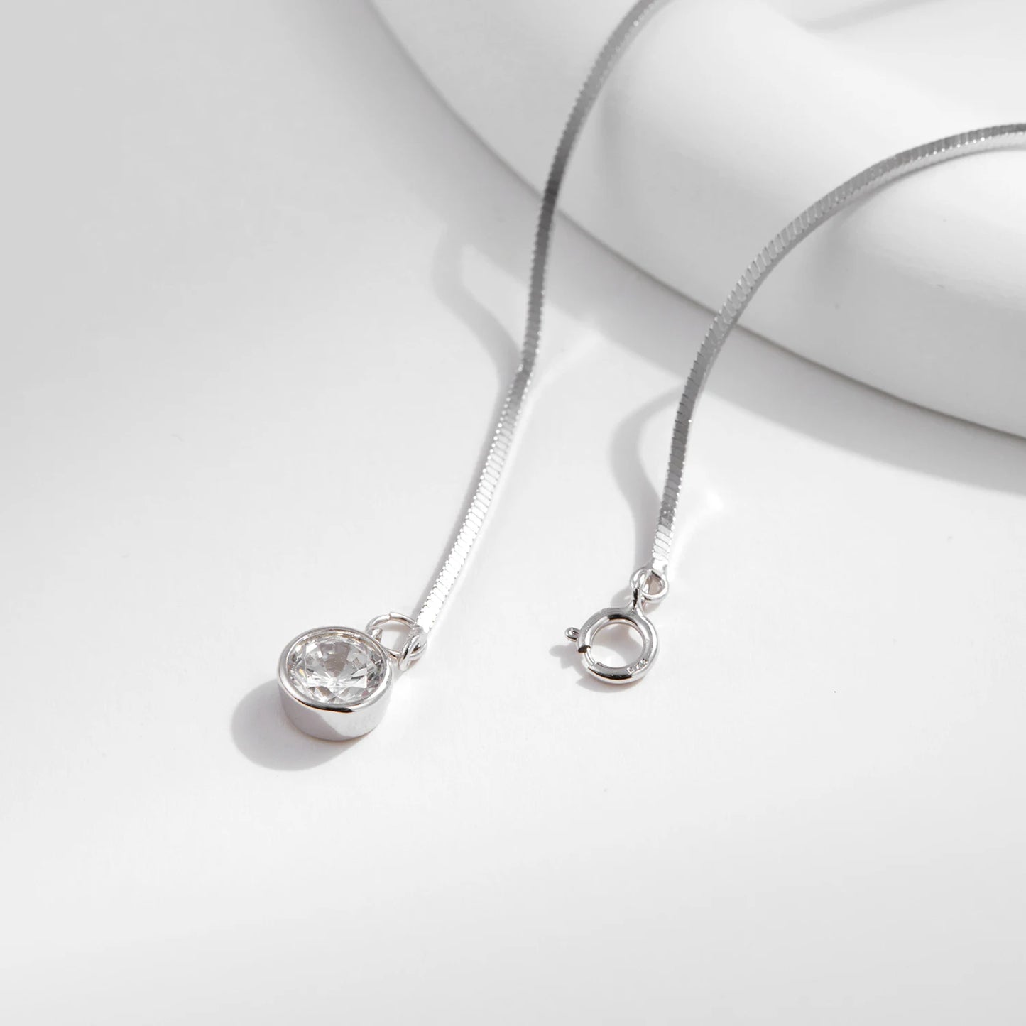 The IceBoyDC 925 Dainty Snake Bracelet w/ Dangling CZ