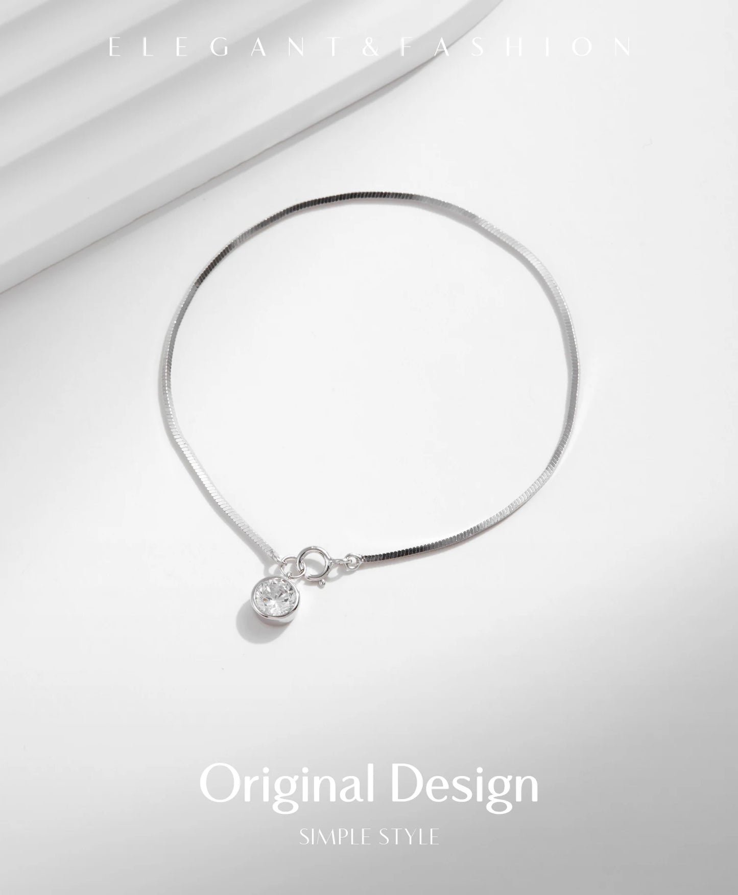The IceBoyDC 925 Dainty Snake Bracelet w/ Dangling CZ