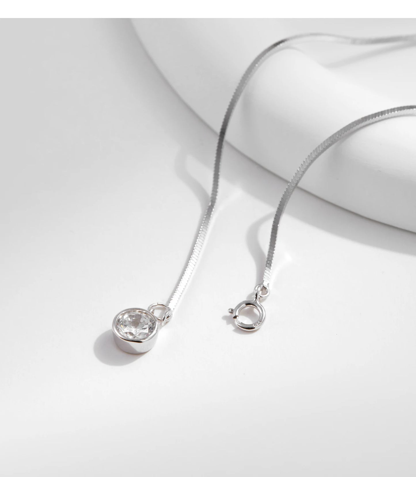 The IceBoyDC 925 Dainty Snake Bracelet w/ Dangling CZ