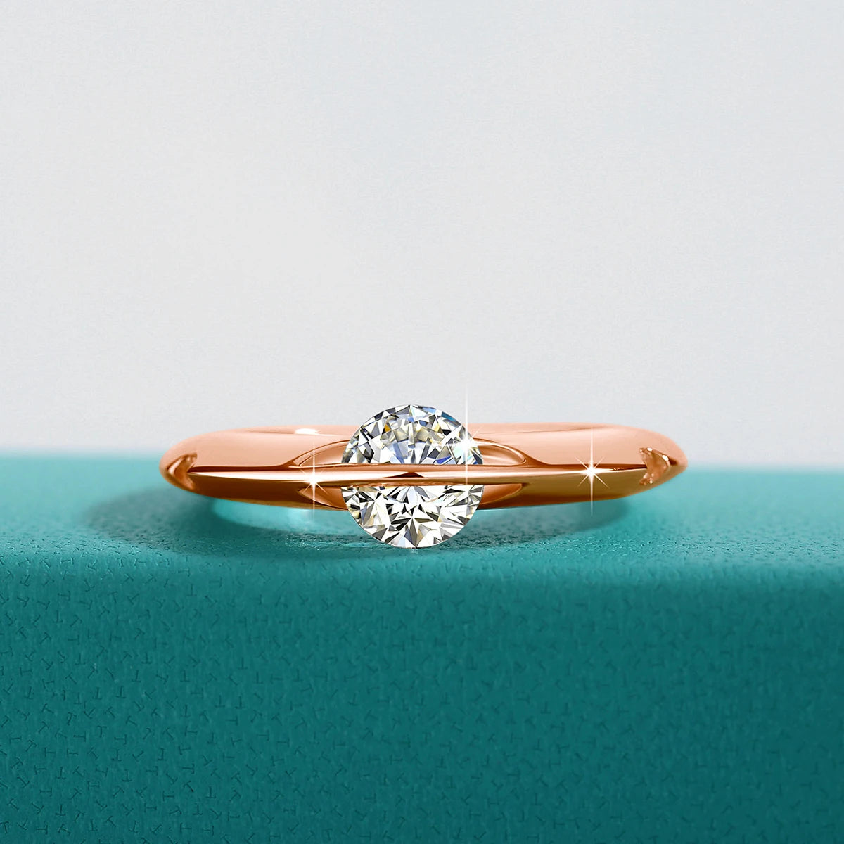 The Rose Gold Rotating Moissanite Solitaire Classic Ring