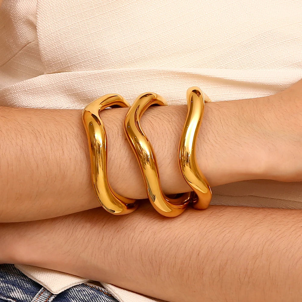 The 18K Gold Plated Exaggerated Liquid Wave Bangle Bracelet