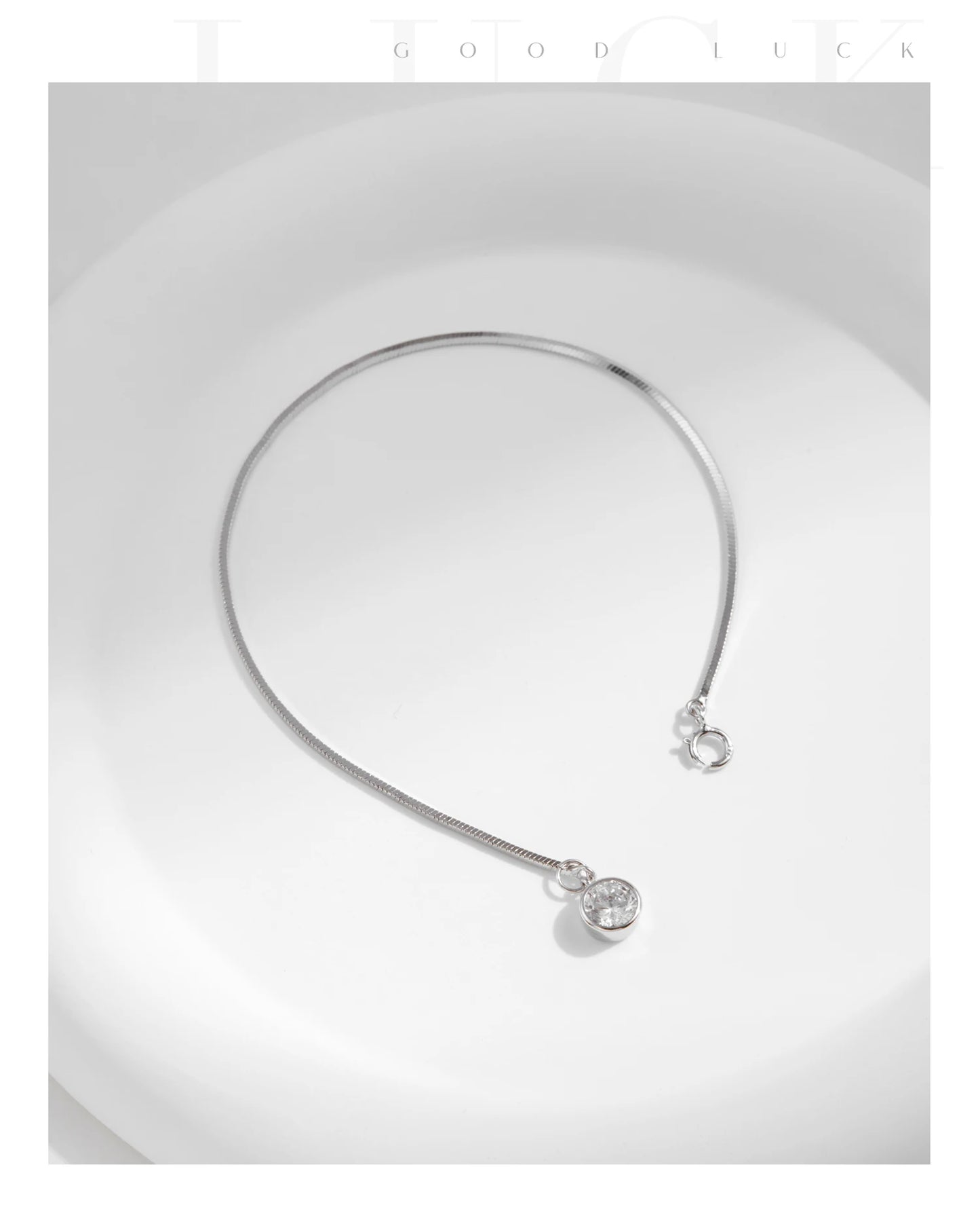 The IceBoyDC 925 Dainty Snake Bracelet w/ Dangling CZ