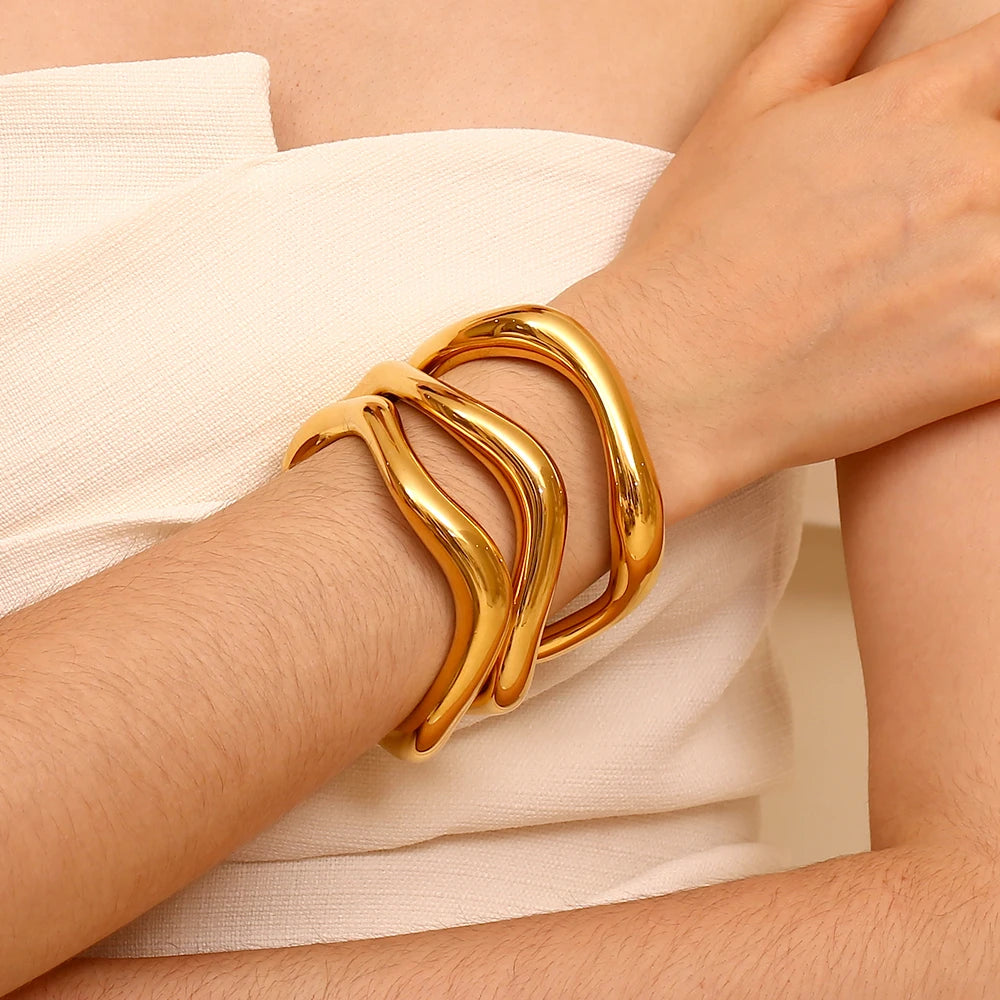 The 18K Gold Plated Exaggerated Liquid Wave Bangle Bracelet