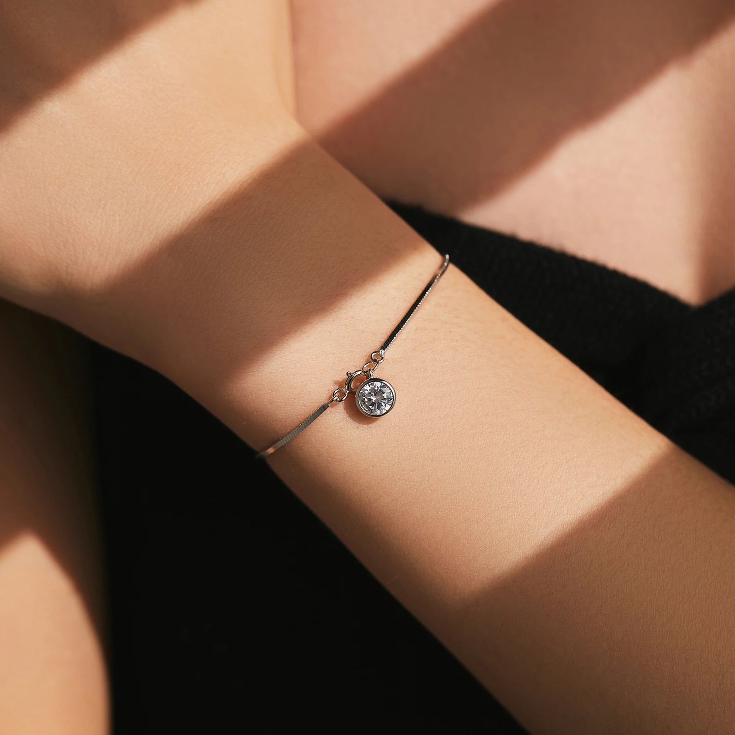 The IceBoyDC 925 Dainty Snake Bracelet w/ Dangling CZ