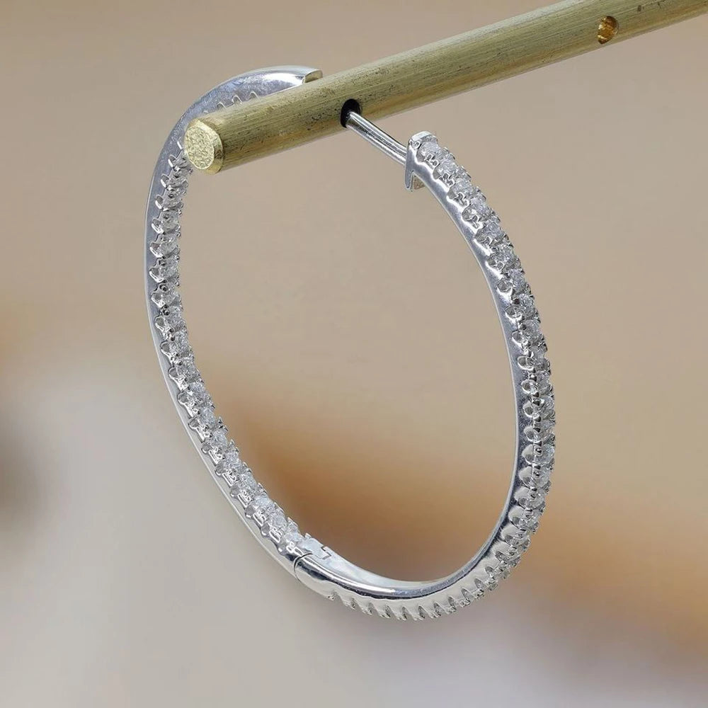 IceBoyDC. | 1.2mm D VVS Lab Grown Moissanite Hoop Earrings in Sterling Silver